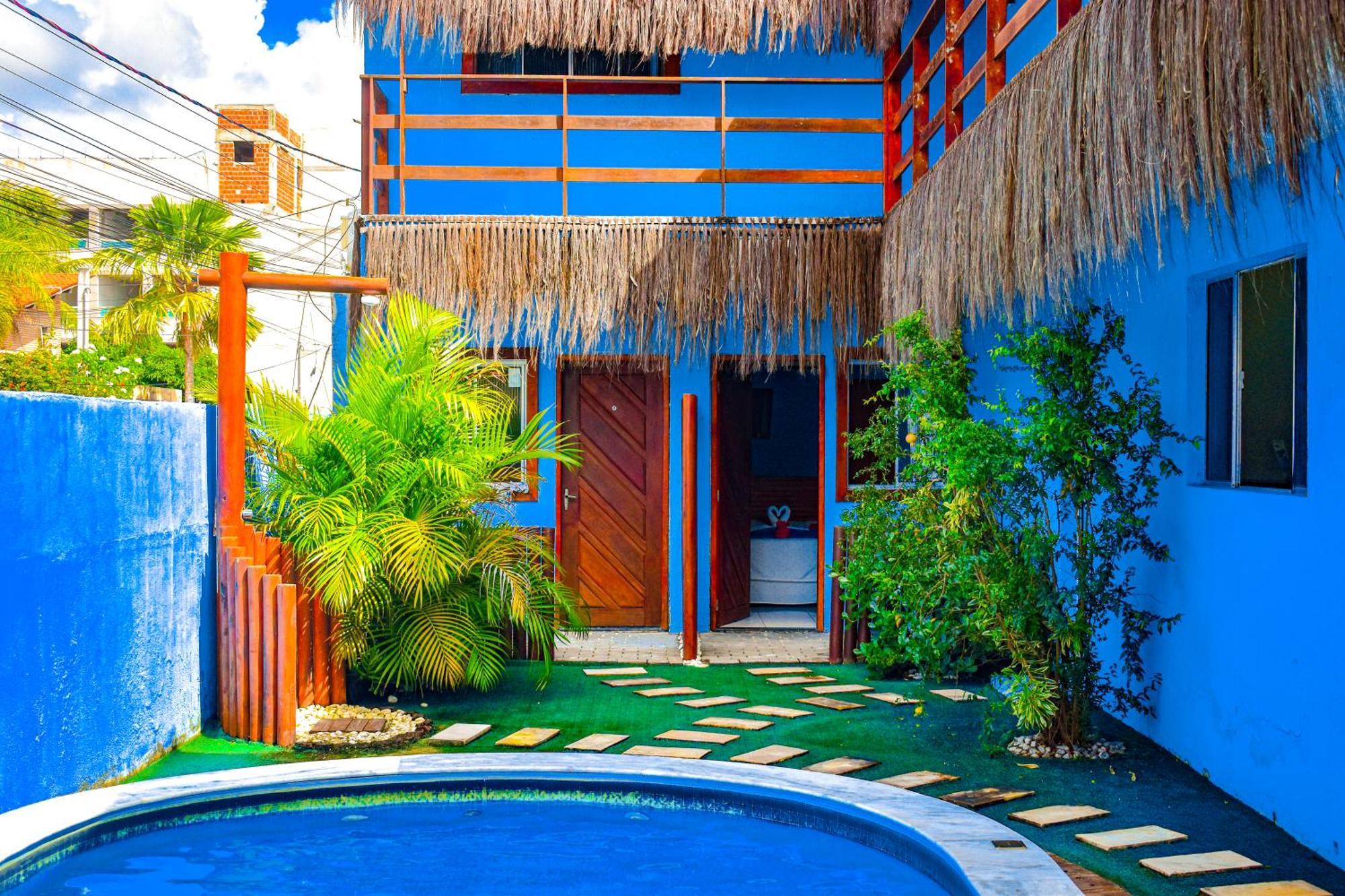 Suíte com Vista para a Piscina